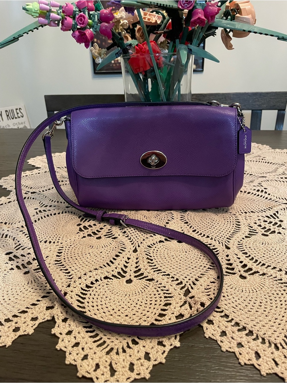Coach Ruby crossbody bag features in vibrant purple leather